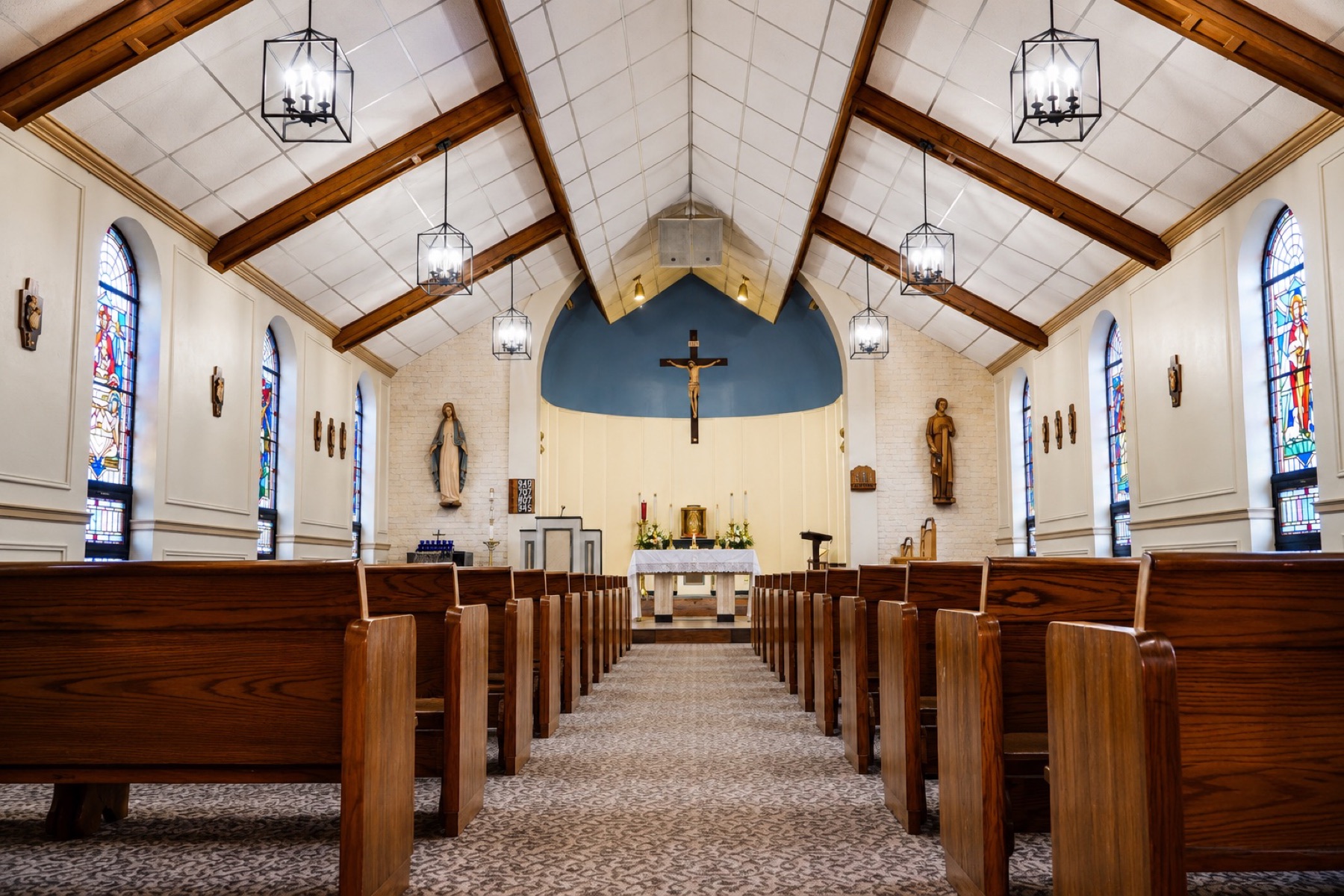 The nave and sanctuary inside Our Lady of Perpetual Help Catholic Church