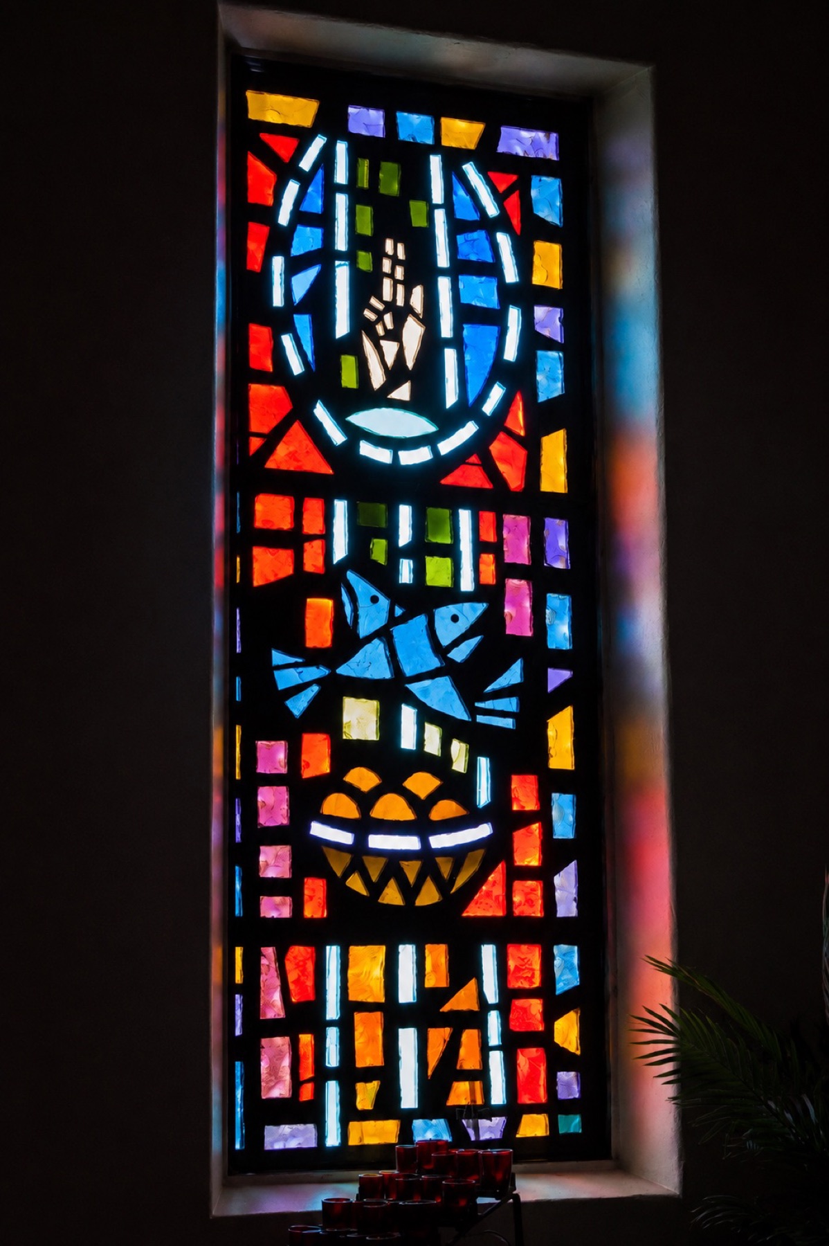 Colorful stained-glass window inside St. Ann Catholic Church