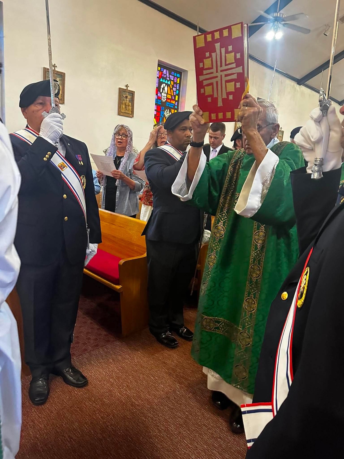 Archbishop Coakley and clergy processing into St. Ann before Mass